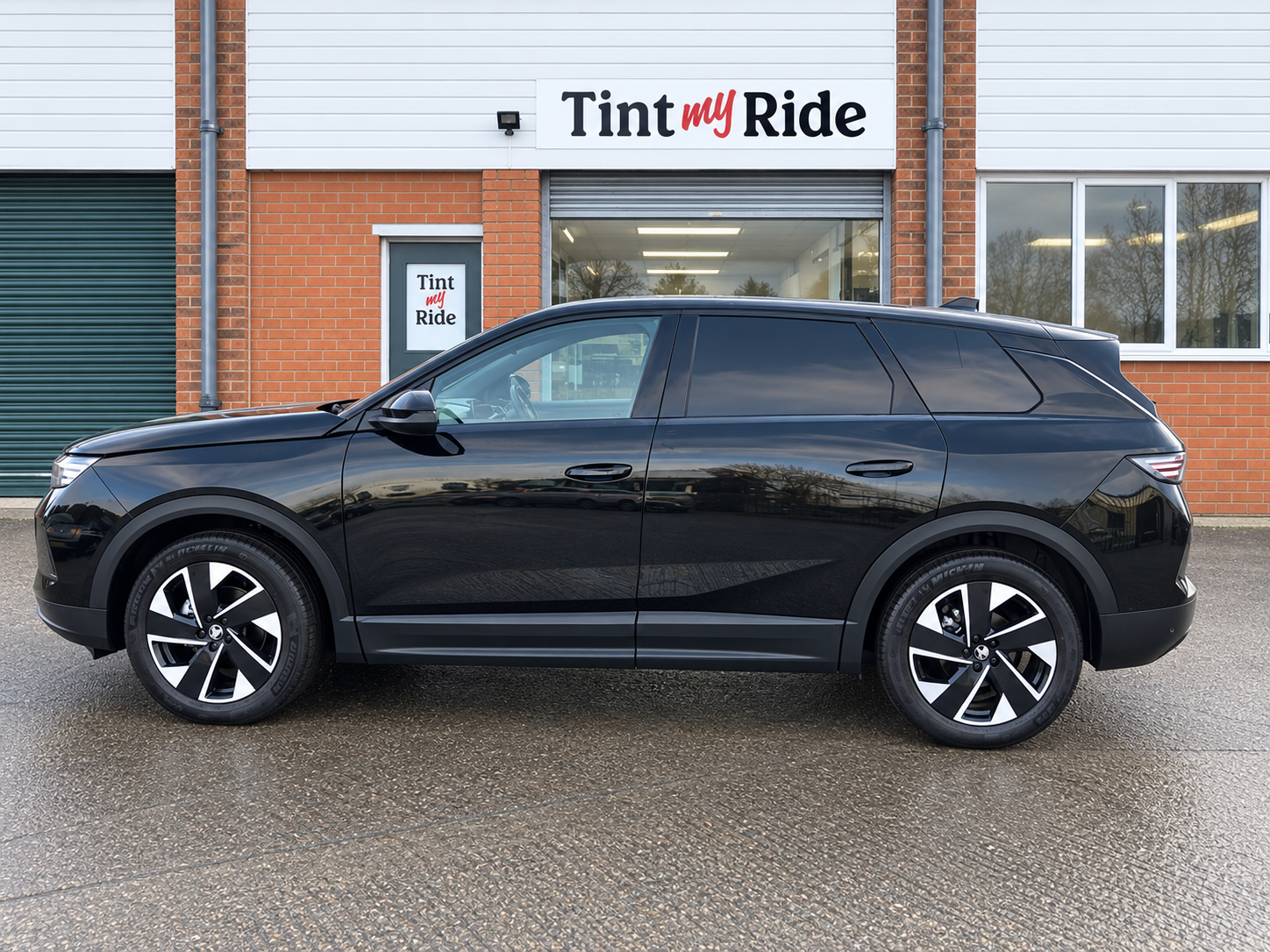 Black Range Rover Velar with rear tint