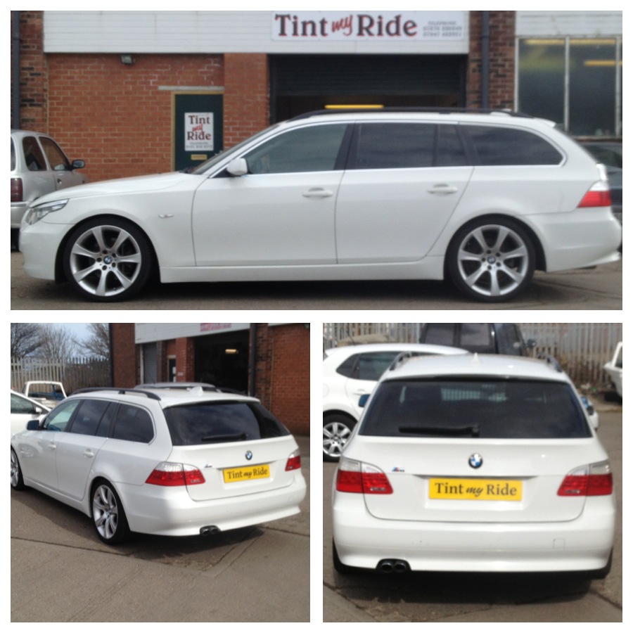 BMW 5 Series Touring with dark tinted rear windows