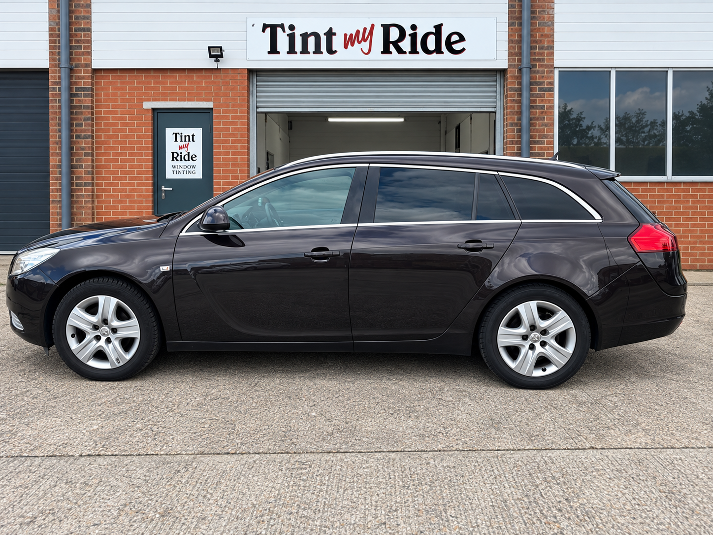 Black Insignia Sports Tourer with tinted glass