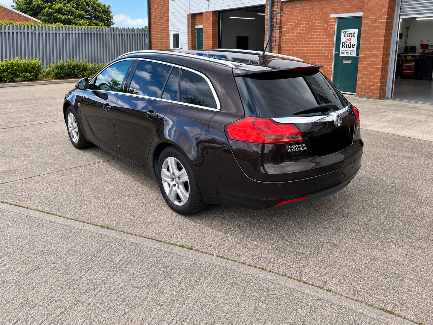 Black Vauxhall Insignia estate with rear tint
