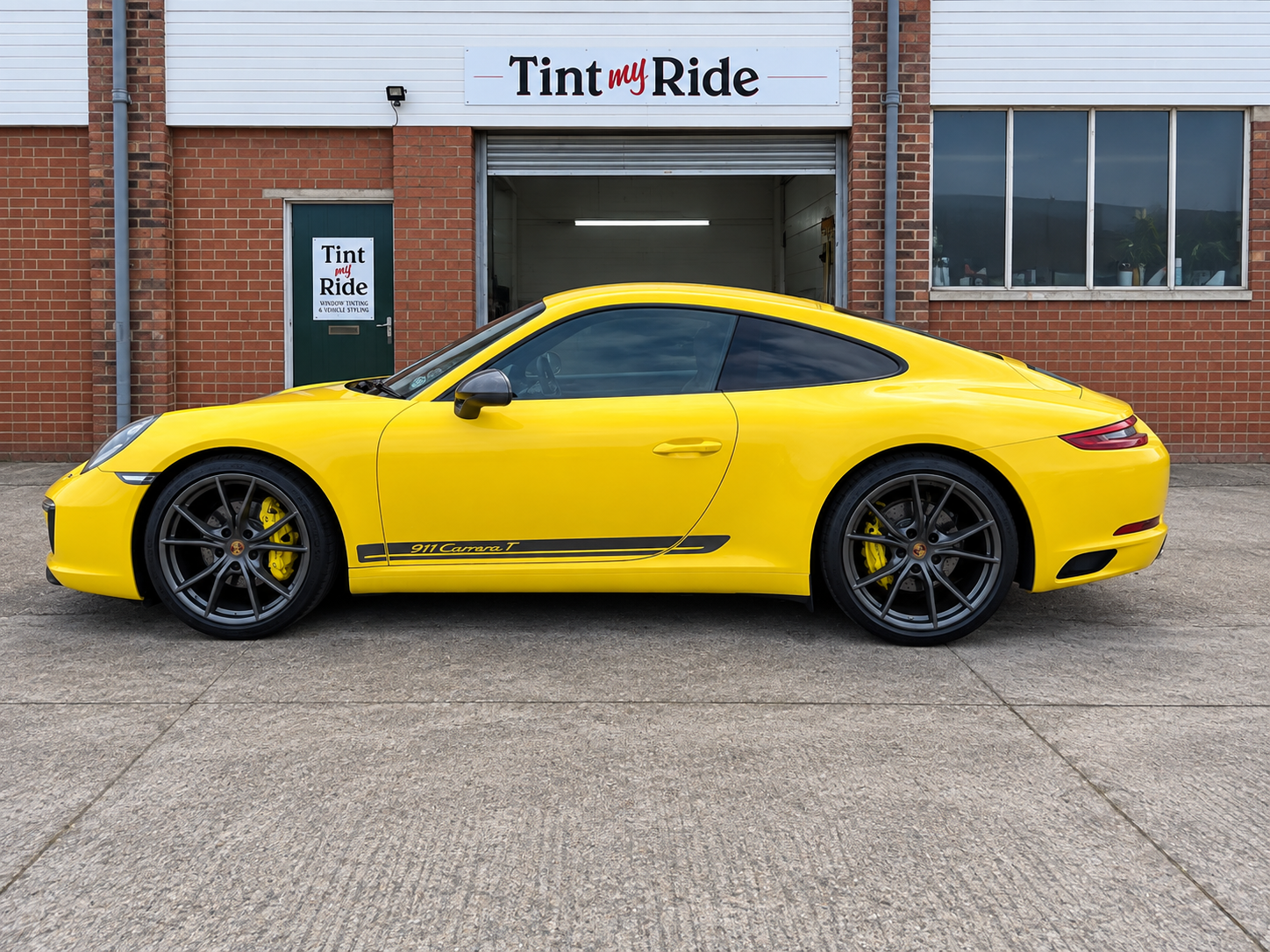 Yellow Porsche outside the Tint My Ride workshop in Whitley Bay